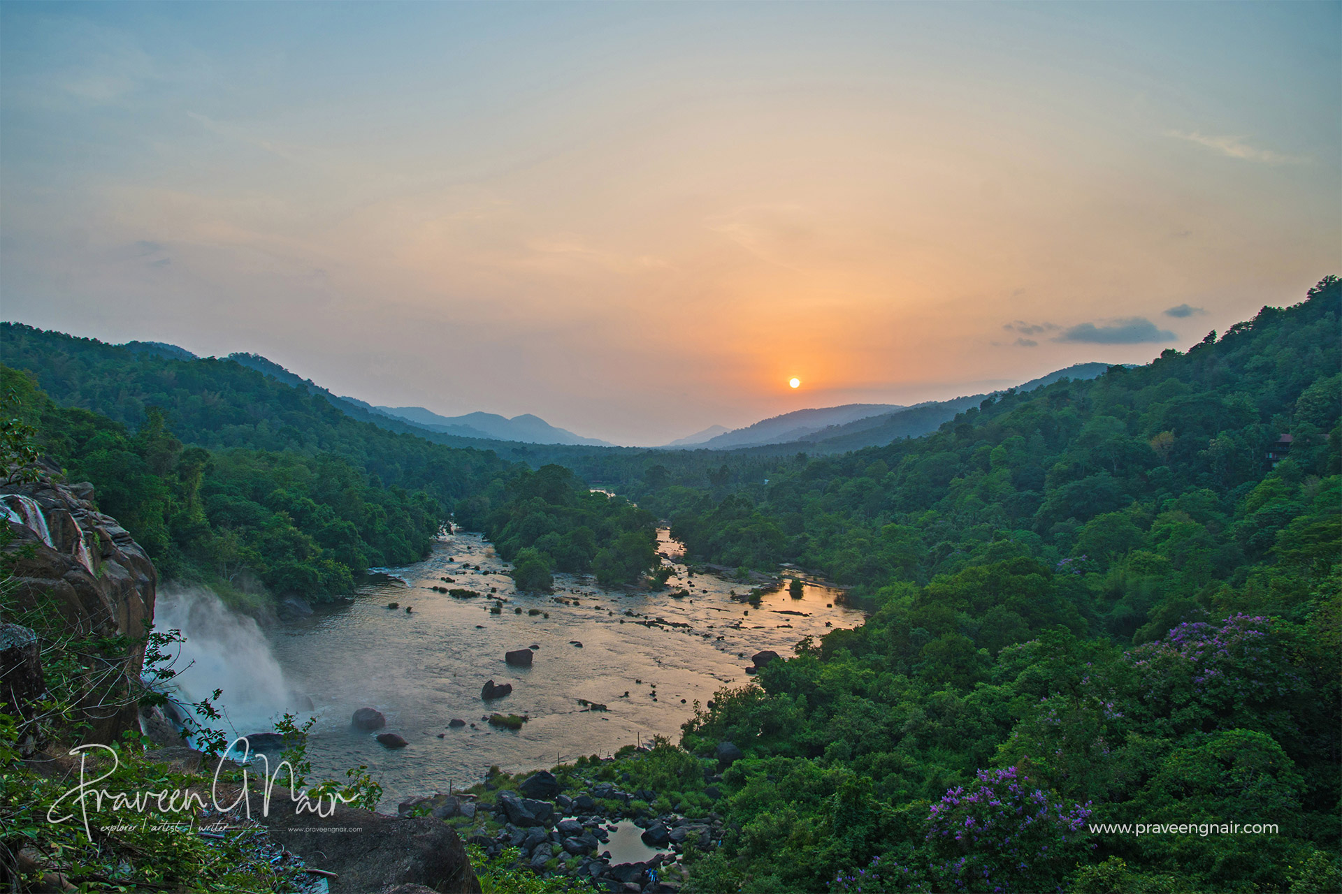Athirappilly Water Falls and forest in sunset time